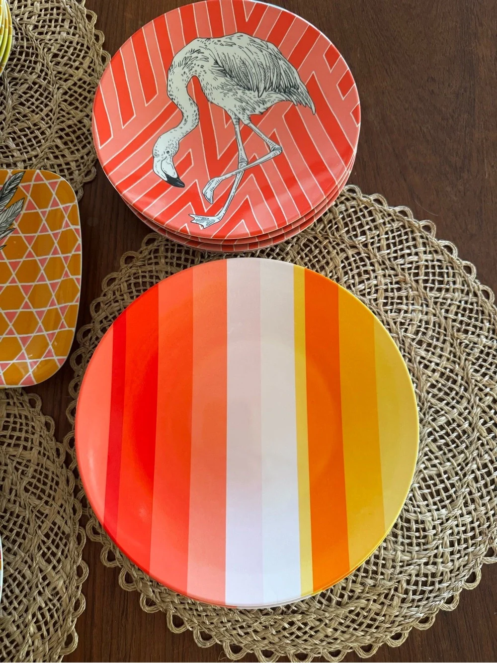 Set of 38 West Elm plates with colorful geometric prints & animal illustrations